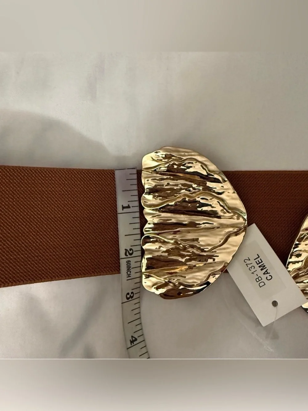 Brown elastic waistband belt with gold tone butterfly buckle
